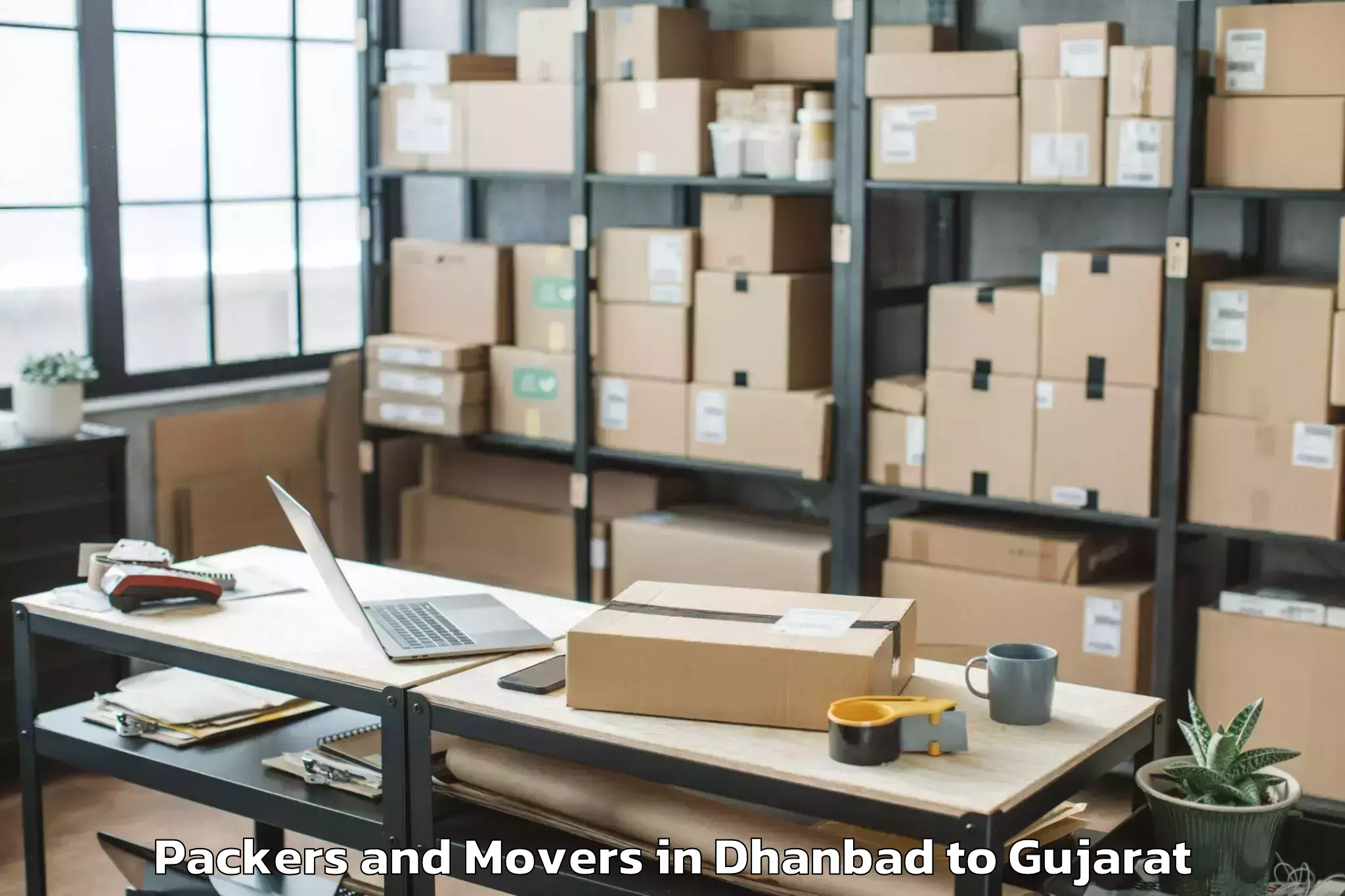 Professional Dhanbad to Kadi Sarva Vishwavidyalaya Gan Packers And Movers